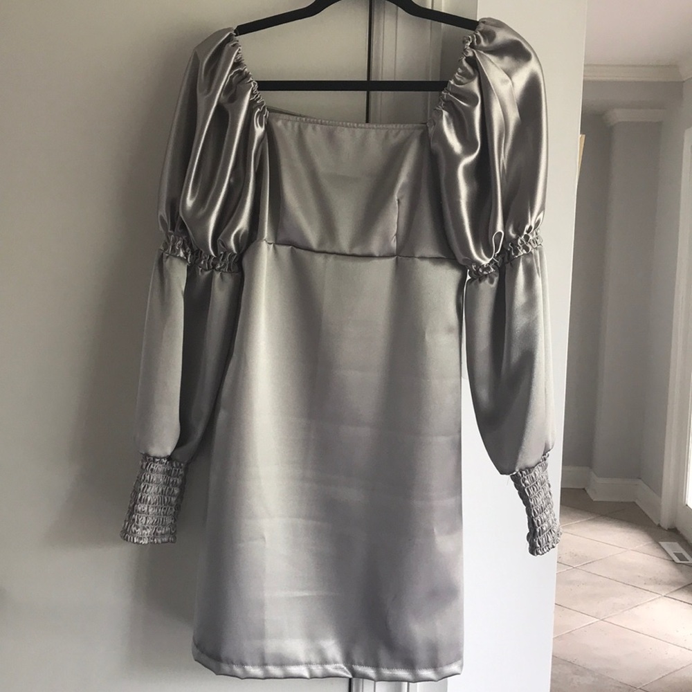 A long sleeve silver puff sleeve dress